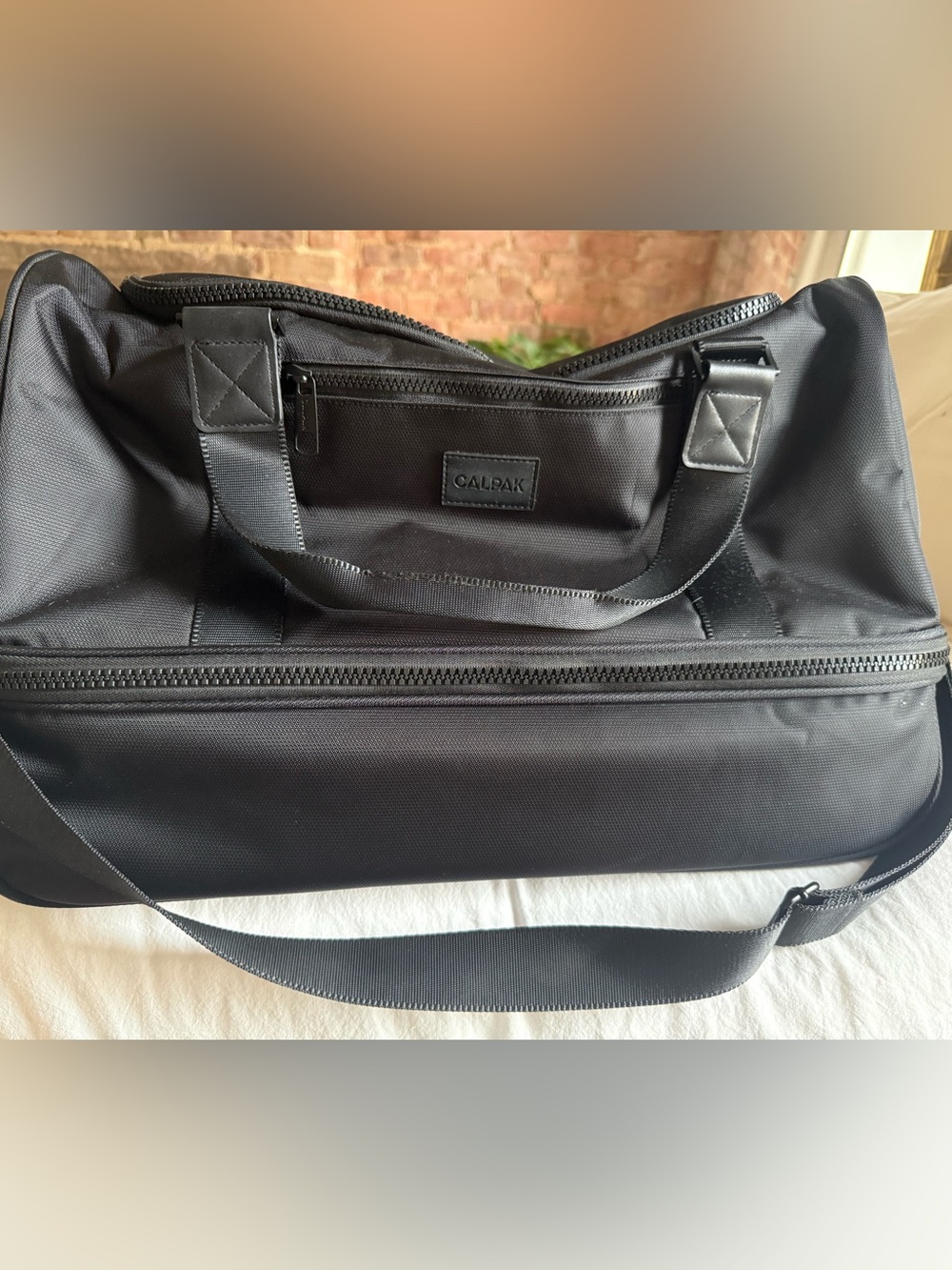 Calpak Black Weekender Bag with bottom shoe storage